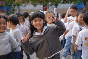 Pose ceria seorang siswa PG-K GIS 3 Jogja sesaat sebelum agenda opening dimulai